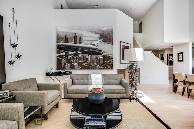 23 Matt Hoxie Trl Unit 23, Plymouth, MA 02360 - living room featuring wood finished floors and a towering ceiling