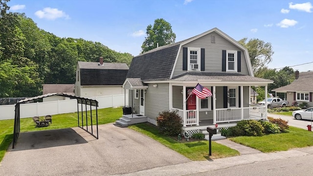 39 Doyle Ave, Dracut, MA 01826 - colonial inspired home featuring covered porch, a shingled roof, a gambrel roof, and asphalt driveway