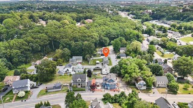 39 Doyle Ave, Dracut, MA 01826 - aerial perspective of suburban area with a heavily wooded area