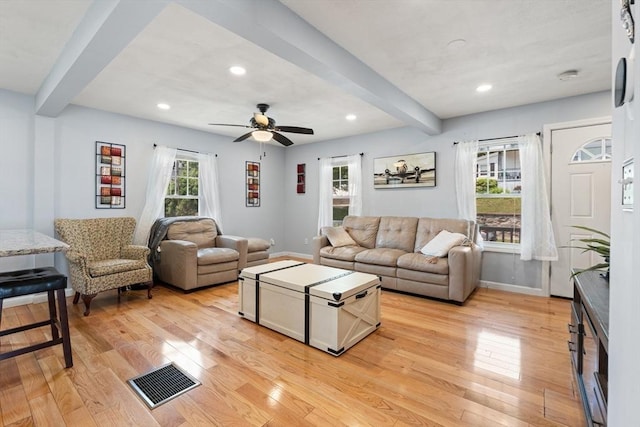39 Doyle Ave, Dracut, MA 01826 - living area with beamed ceiling, light wood finished floors, ceiling fan, and recessed lighting