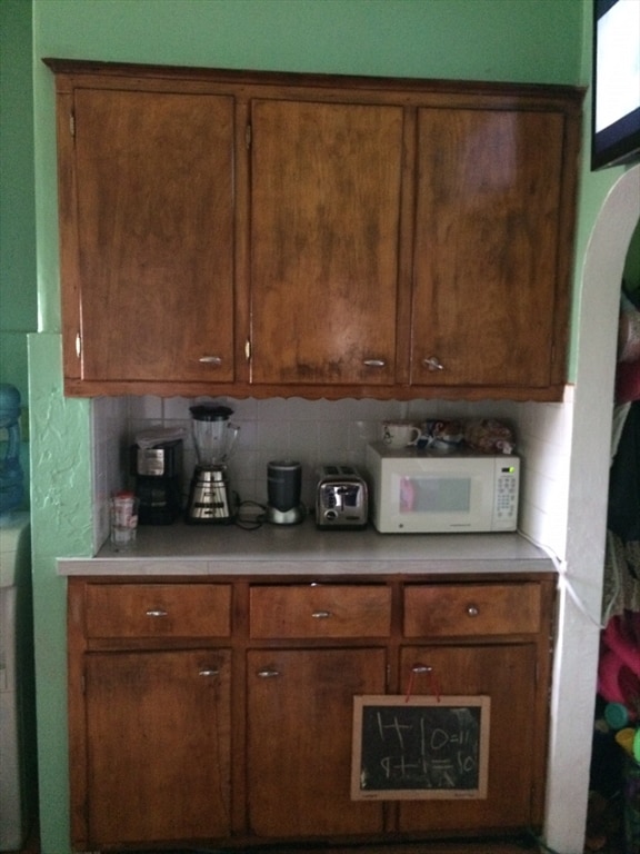 kitchen featuring backsplash