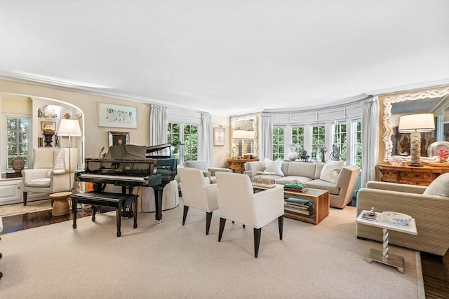 living room featuring crown molding