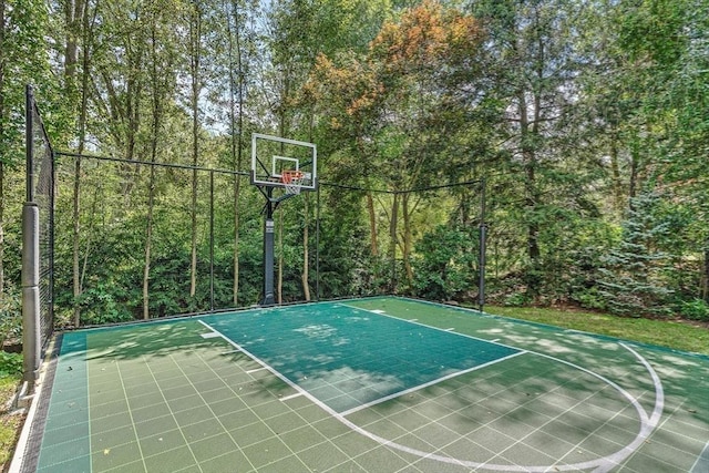 view of basketball court featuring basketball hoop