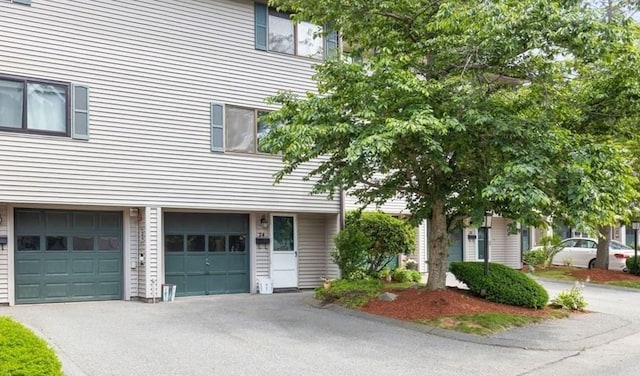 24 Crestview Dr Unit 24, Malden, MA 02148 - view of front of house featuring driveway and a garage