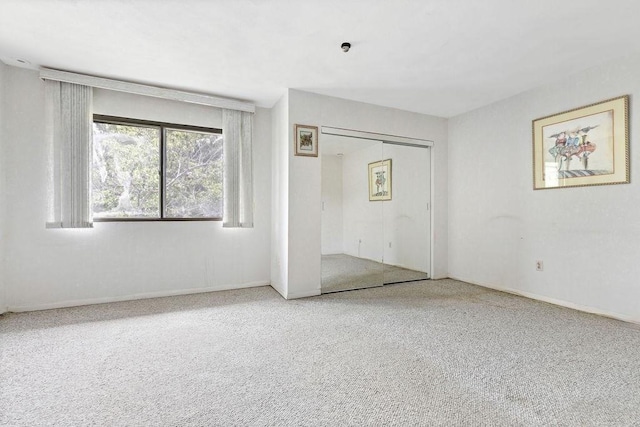24 Crestview Dr Unit 24, Malden, MA 02148 - unfurnished bedroom featuring carpet and a closet