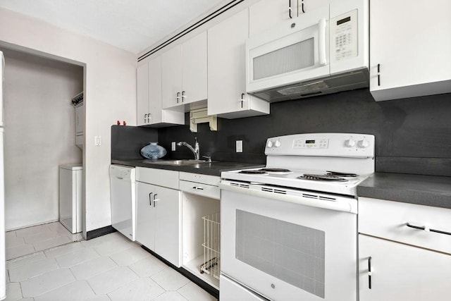 24 Crestview Dr Unit 24, Malden, MA 02148 - kitchen featuring white appliances, dark countertops, white cabinets, and light tile patterned flooring
