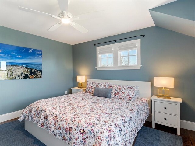 bedroom featuring baseboards, a ceiling fan, and wood finished floors