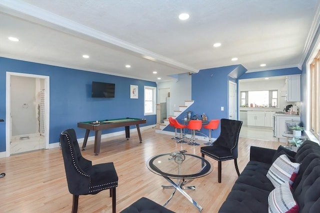 rec room with pool table, light wood-style flooring, and ornamental molding