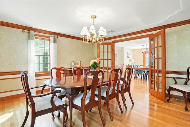 105 Old Barn Path, Marshfield, MA 02050 - dining area featuring a chandelier, light wood-type flooring, ornamental molding, and baseboards