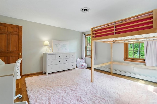 105 Old Barn Path, Marshfield, MA 02050 - bedroom featuring multiple windows, wood finished floors, and baseboards