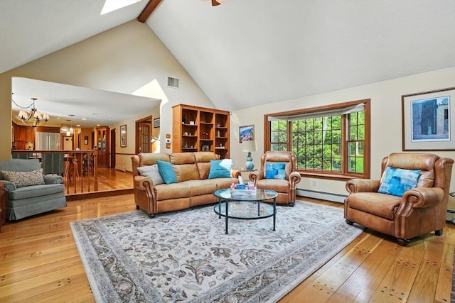 105 Old Barn Path, Marshfield, MA 02050 - living area with baseboard heating, high vaulted ceiling, a chandelier, light wood-type flooring, and a skylight