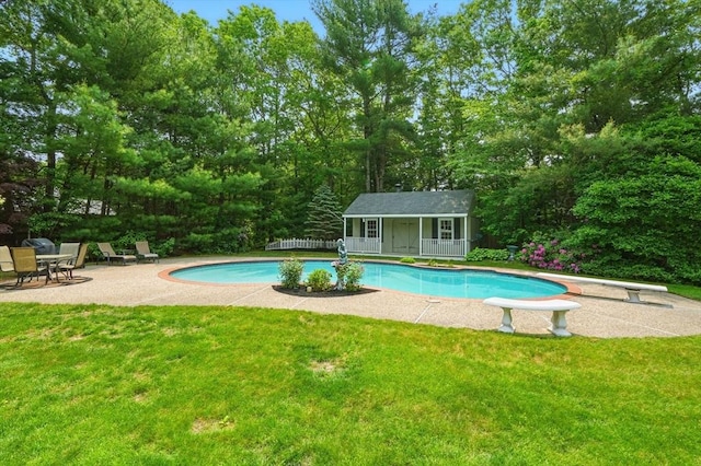 105 Old Barn Path, Marshfield, MA 02050 - outdoor pool with a diving board, a patio area, an outdoor structure, and view of scattered trees