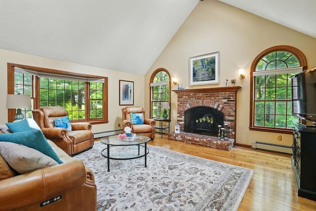 105 Old Barn Path, Marshfield, MA 02050 - living area with baseboard heating, wood-type flooring, high vaulted ceiling, baseboards, and a fireplace