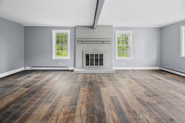 628 Rindge Rd, Fitchburg, MA 01420 - unfurnished living room featuring healthy amount of natural light, a baseboard radiator, wood finished floors, crown molding, and beam ceiling