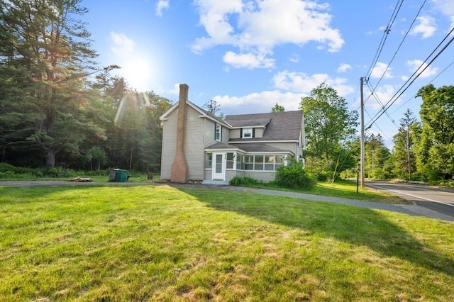 628 Rindge Rd, Fitchburg, MA 01420 - view of front of home featuring a front lawn and a chimney