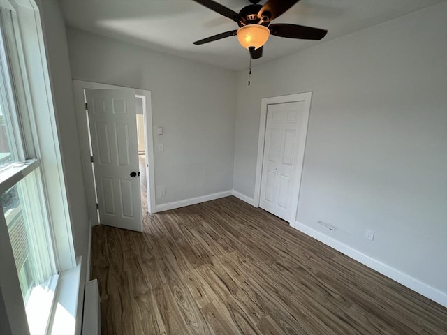 110 Old Harbor St, Boston, MA 02127 - unfurnished room with dark wood-style flooring, baseboards, and plenty of natural light
