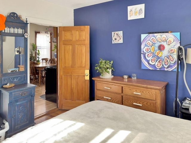 bedroom featuring wood finished floors