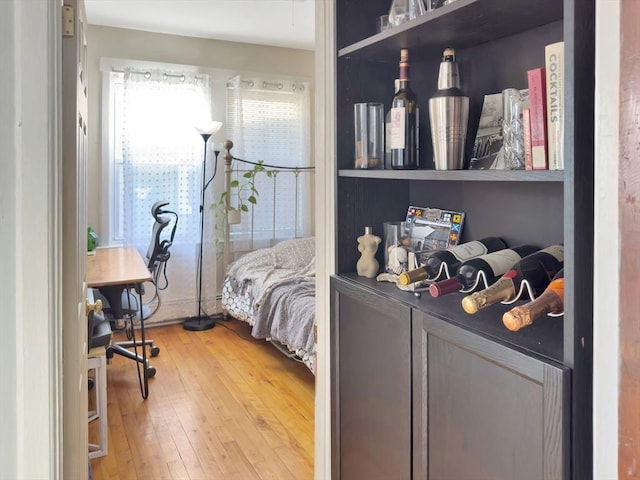 bedroom featuring wood-type flooring