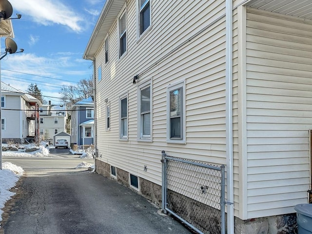 view of side of home with a residential view