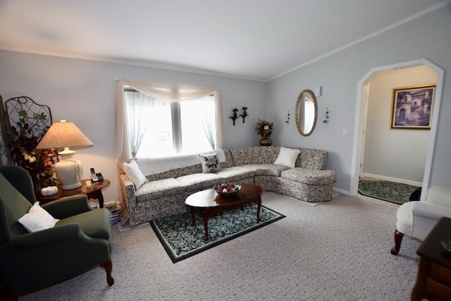 living area featuring carpet, crown molding, baseboards, and arched walkways