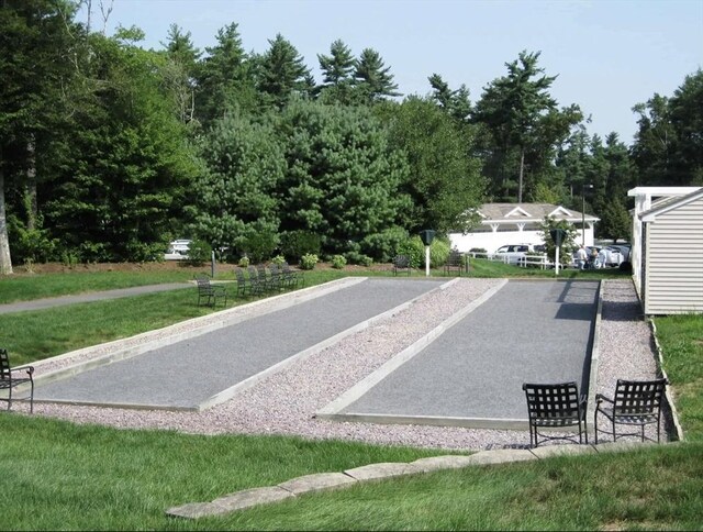 view of community featuring a yard