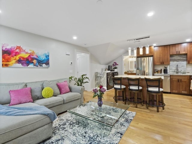 6 Nelly St Unit 3, Wakefield, MA 01880 - living area with light wood-style floors, recessed lighting, vaulted ceiling, and bar area