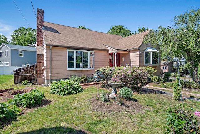 4 Merrow Ln, Stoneham, MA 02180 - view of front of property with a chimney and a shingled roof