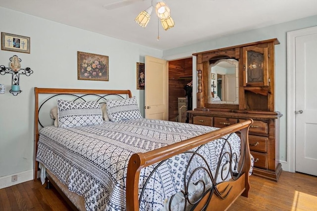 4 Merrow Ln, Stoneham, MA 02180 - bedroom featuring wood finished floors, baseboards, a closet, and a ceiling fan