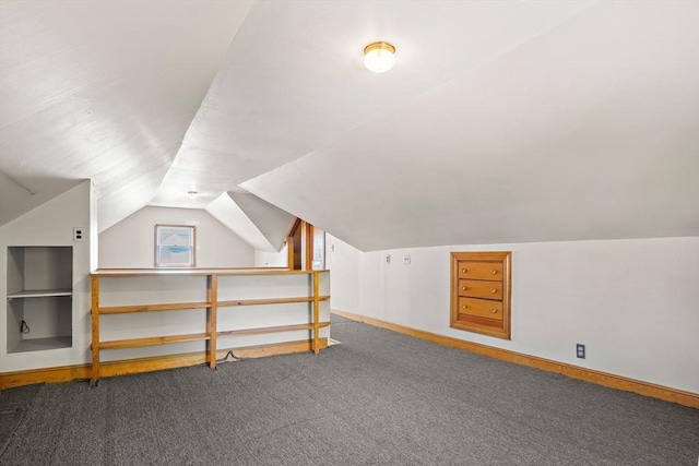 4 Merrow Ln, Stoneham, MA 02180 - additional living space featuring carpet floors, baseboards, and vaulted ceiling