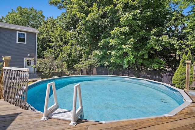 4 Merrow Ln, Stoneham, MA 02180 - view of swimming pool featuring a wooden deck