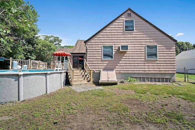 4 Merrow Ln, Stoneham, MA 02180 - rear view of house with a deck