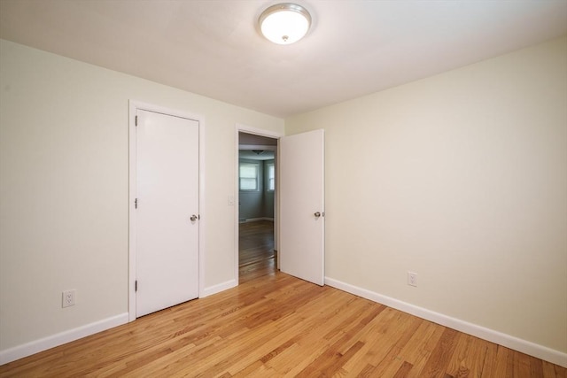 226 Dutchess St, Springfield, MA 01129 - unfurnished bedroom with baseboards and light wood finished floors