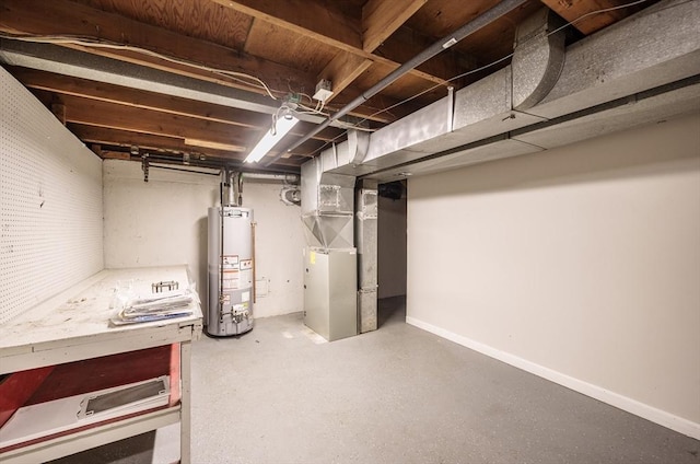 226 Dutchess St, Springfield, MA 01129 - below grade area featuring gas water heater, heating unit, and baseboards