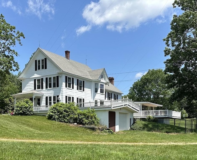 6 Weaver Farm Rd, Rutland, MA 01543 - back of house with a chimney, a lawn, a garage, and a shingled roof