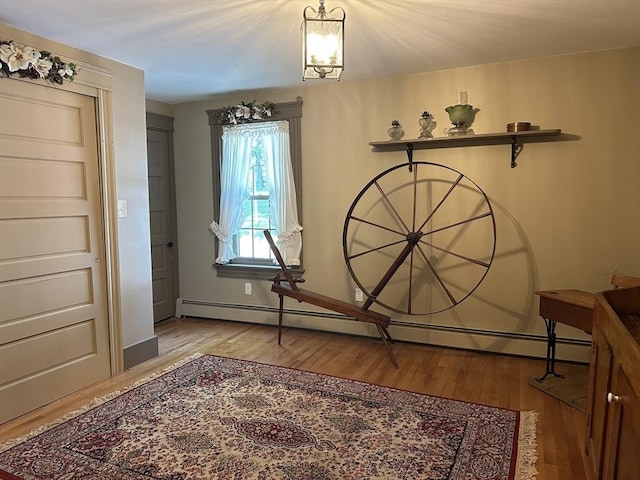 6 Weaver Farm Rd, Rutland, MA 01543 - foyer entrance with a baseboard radiator and wood finished floors