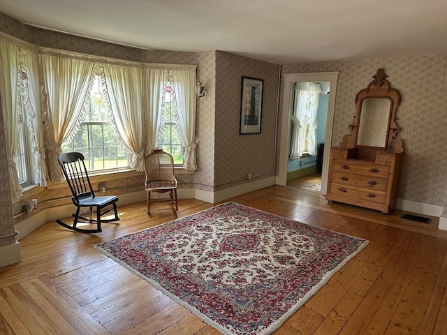 6 Weaver Farm Rd, Rutland, MA 01543 - sitting room featuring wallpapered walls and hardwood / wood-style flooring