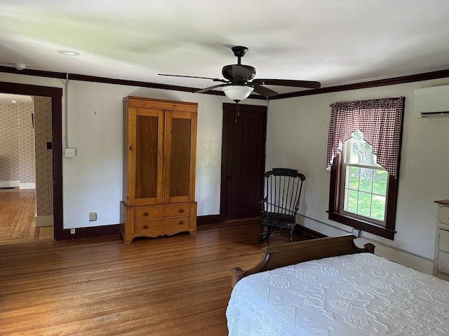 6 Weaver Farm Rd, Rutland, MA 01543 - bedroom with a wall unit AC, wood finished floors, ornamental molding, and ceiling fan