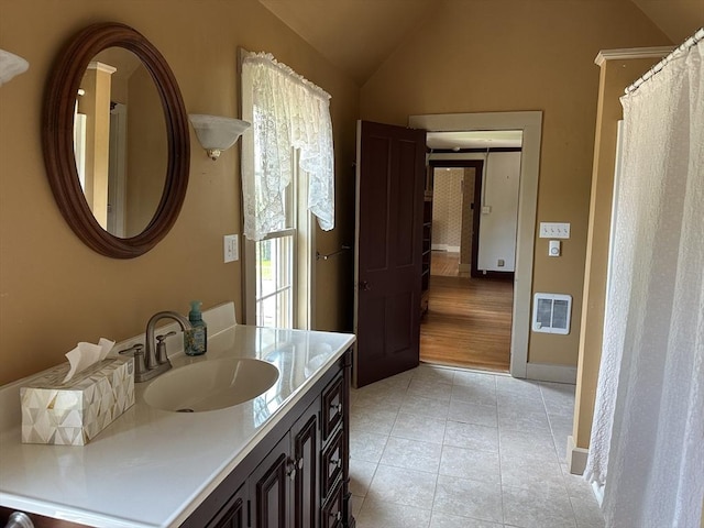 6 Weaver Farm Rd, Rutland, MA 01543 - full bathroom featuring lofted ceiling, tile patterned floors, vanity, and heating unit