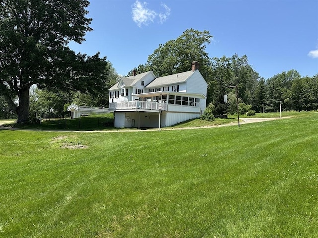 6 Weaver Farm Rd, Rutland, MA 01543 - rear view of property featuring a yard, a wooden deck, and a chimney