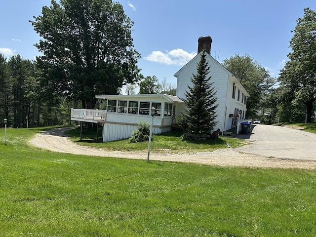 6 Weaver Farm Rd, Rutland, MA 01543 - back of house featuring a sunroom, a chimney, a lawn, and a deck