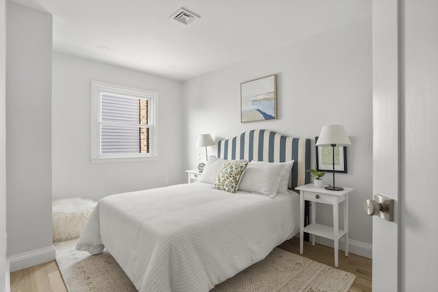 bedroom featuring light hardwood / wood-style floors