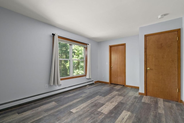 43 Outlook Rd, Billerica, MA 01862 - unfurnished bedroom with a baseboard radiator and wood finished floors