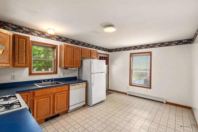 43 Outlook Rd, Billerica, MA 01862 - kitchen with white appliances, a baseboard heating unit, brown cabinetry, and dark countertops