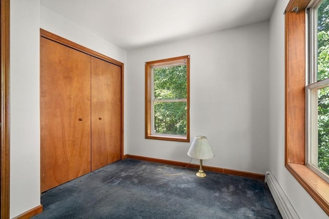 43 Outlook Rd, Billerica, MA 01862 - unfurnished bedroom featuring carpet flooring, a baseboard radiator, and a closet