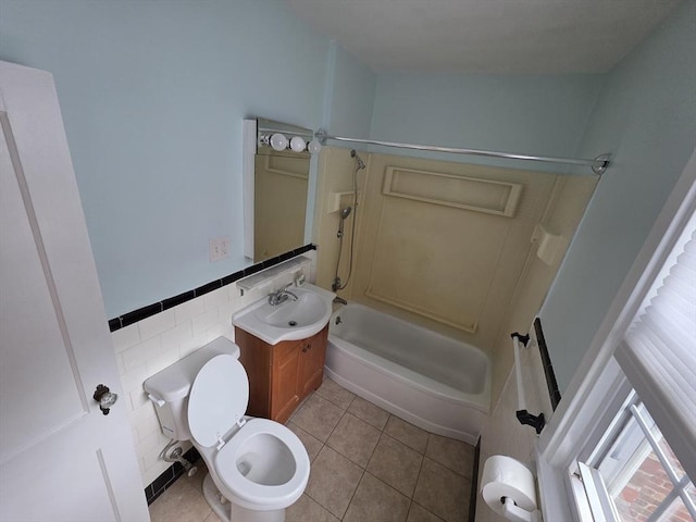 5 Dexter St Unit 6, Malden, MA 02148 - full bathroom with  shower combination, vanity, toilet, tile walls, and tile patterned floors