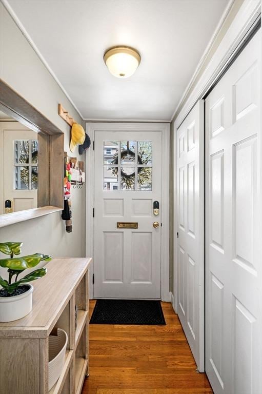 doorway featuring wood finished floors