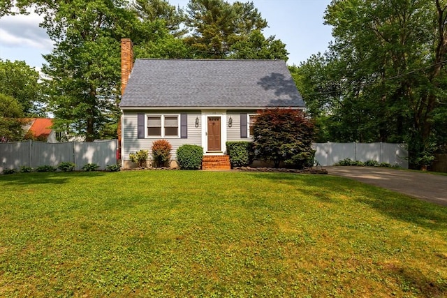 145 Reservoir St, Norton, MA 02766 - cape cod home featuring a chimney and roof with shingles