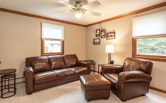 145 Reservoir St, Norton, MA 02766 - living room featuring a ceiling fan, baseboards, baseboard heating, ornamental molding, and light carpet