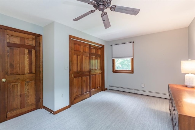 145 Reservoir St, Norton, MA 02766 - bedroom featuring baseboard heating, light colored carpet, a closet, baseboards, and ceiling fan