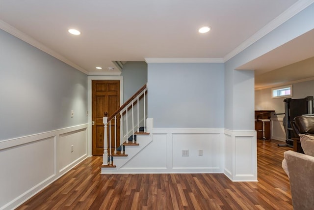 145 Reservoir St, Norton, MA 02766 - stairway with wood finished floors, ornamental molding, recessed lighting, a decorative wall, and a wainscoted wall